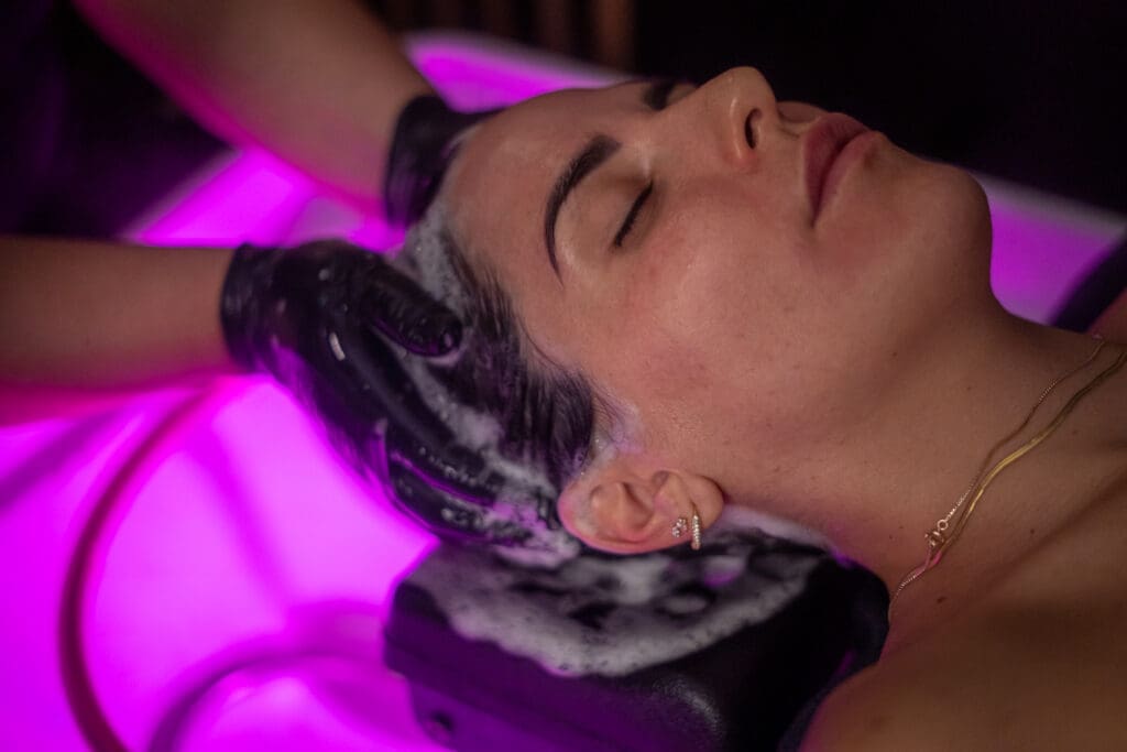 Sage HeadSpa client receiving a treatment